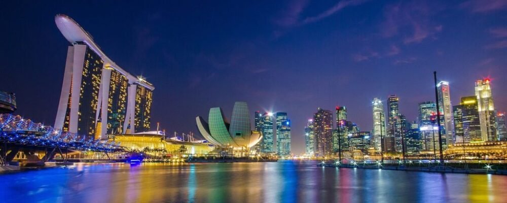 Solo female traveler enjoying the view at Marina Bay Sands, Singapore.